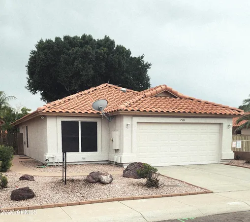 a house with trees in the background