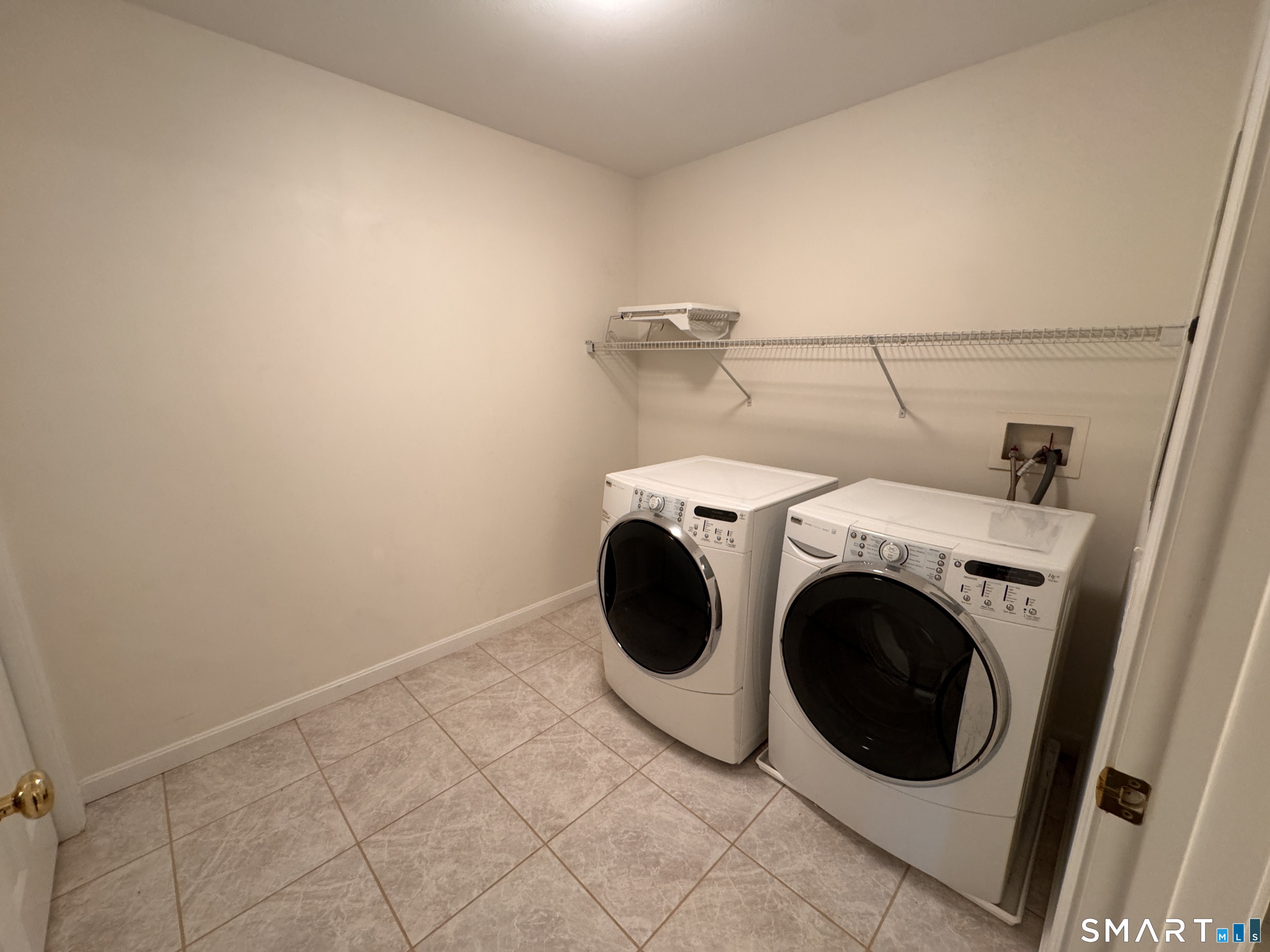 128 Meridian Street, Unit 211 Groton, CT 06340 - Photo 12 of 23 a utility room with dryer and washer