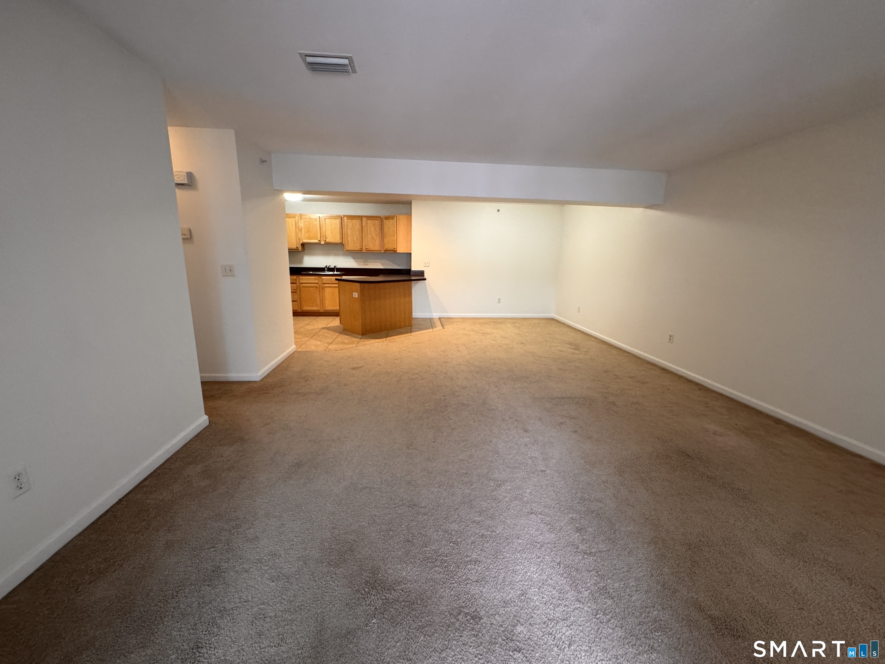 128 Meridian Street, Unit 211 Groton, CT 06340 - Photo 22 of 23 a view of an empty room with a window