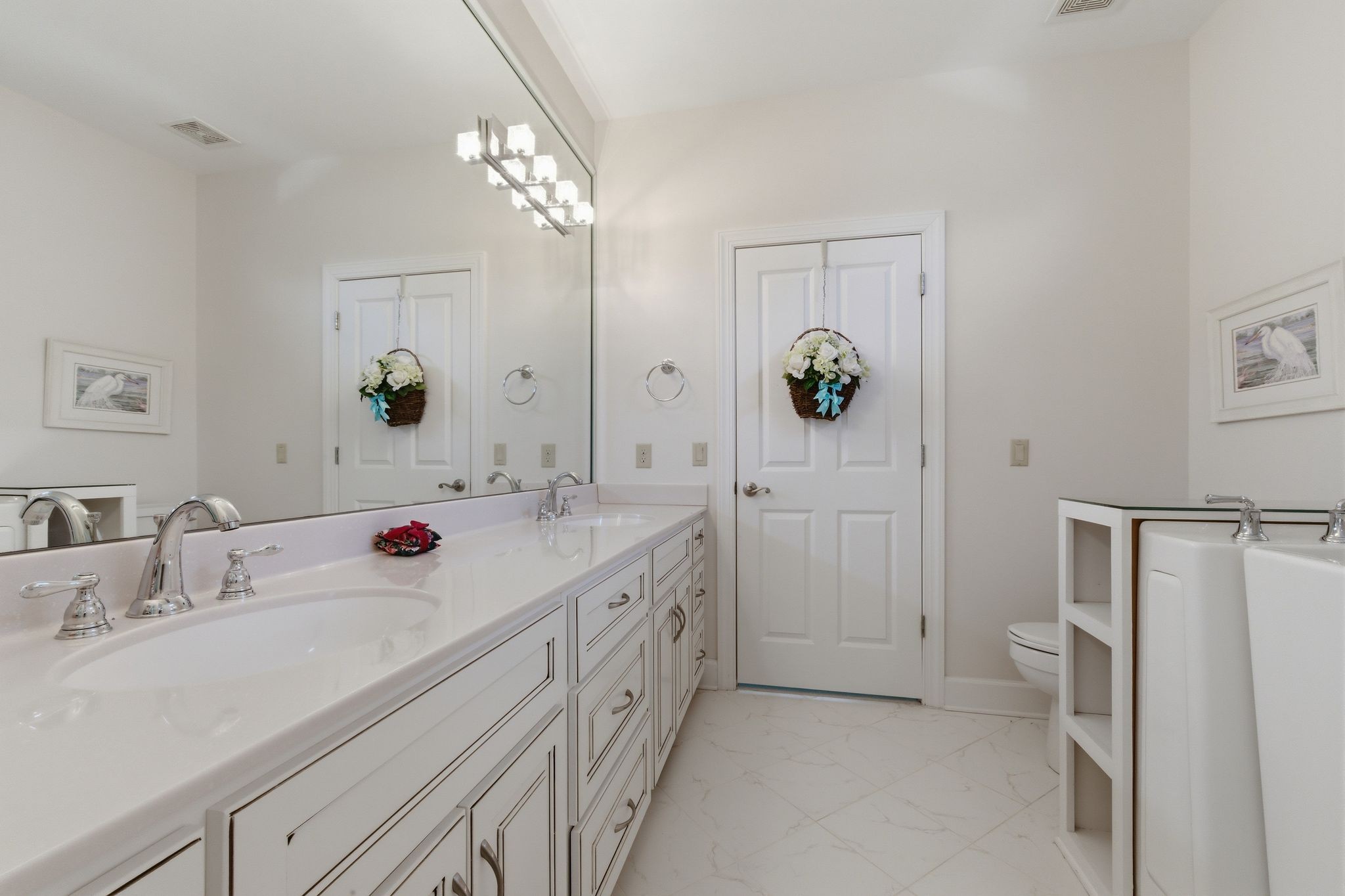 528 Country Club Drive Dickson, TN 37055 - Photo 44 of 55 a bathroom with a double vanity sink and mirror