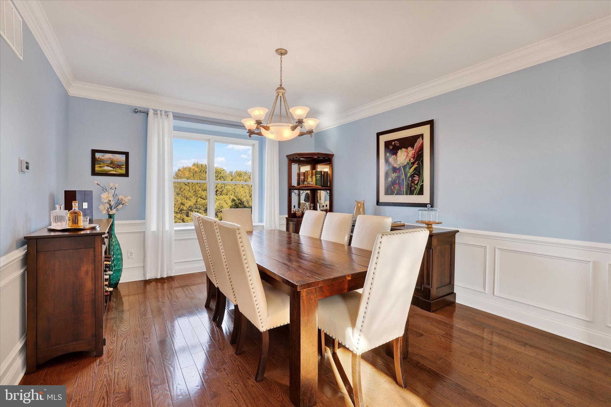 131 Hope Road Holland, PA 18966 - Photo 11 of 55 a view of a dining room with furniture wooden floor and chandelier