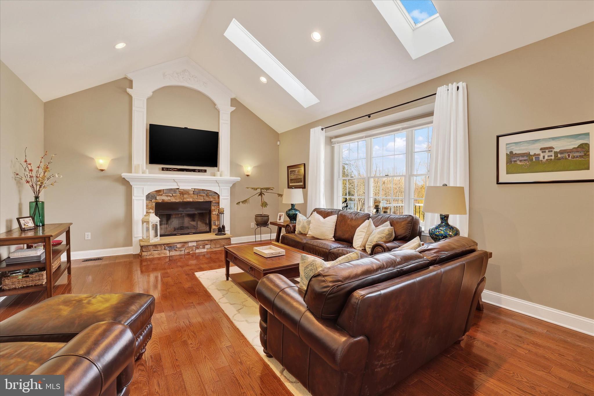 131 Hope Road Holland, PA 18966 - Photo 19 of 55 a living room with fireplace furniture and a flat screen tv
