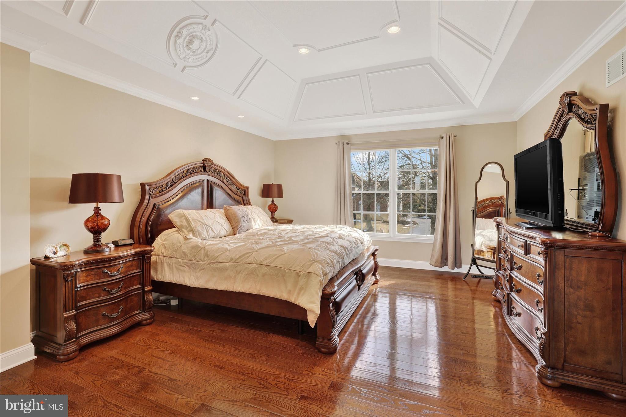 131 Hope Road Holland, PA 18966 - Photo 24 of 55 a spacious bedroom with a bed and wooden floor