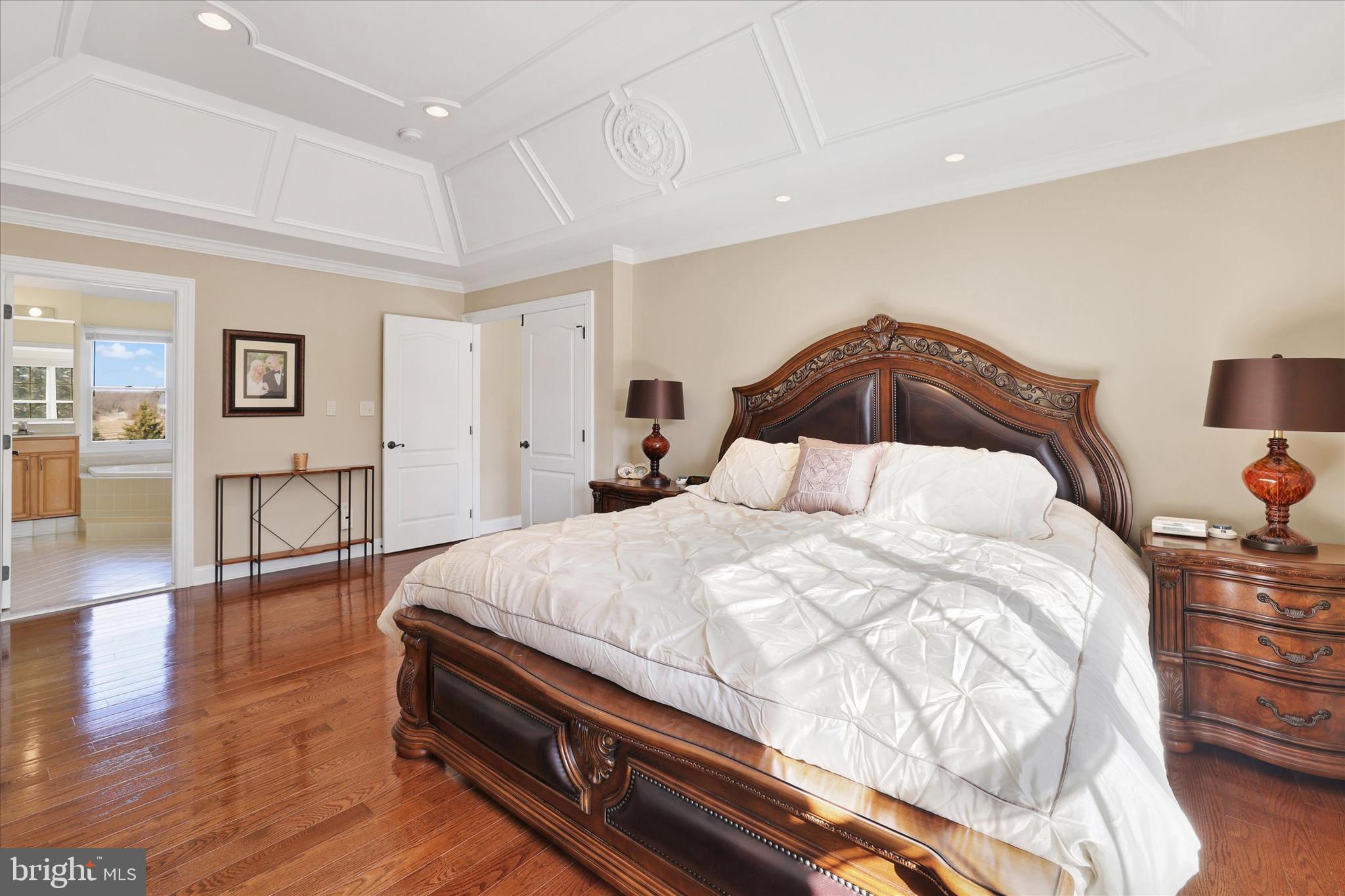 131 Hope Road Holland, PA 18966 - Photo 26 of 55 a spacious bedroom with a bed and wooden floor