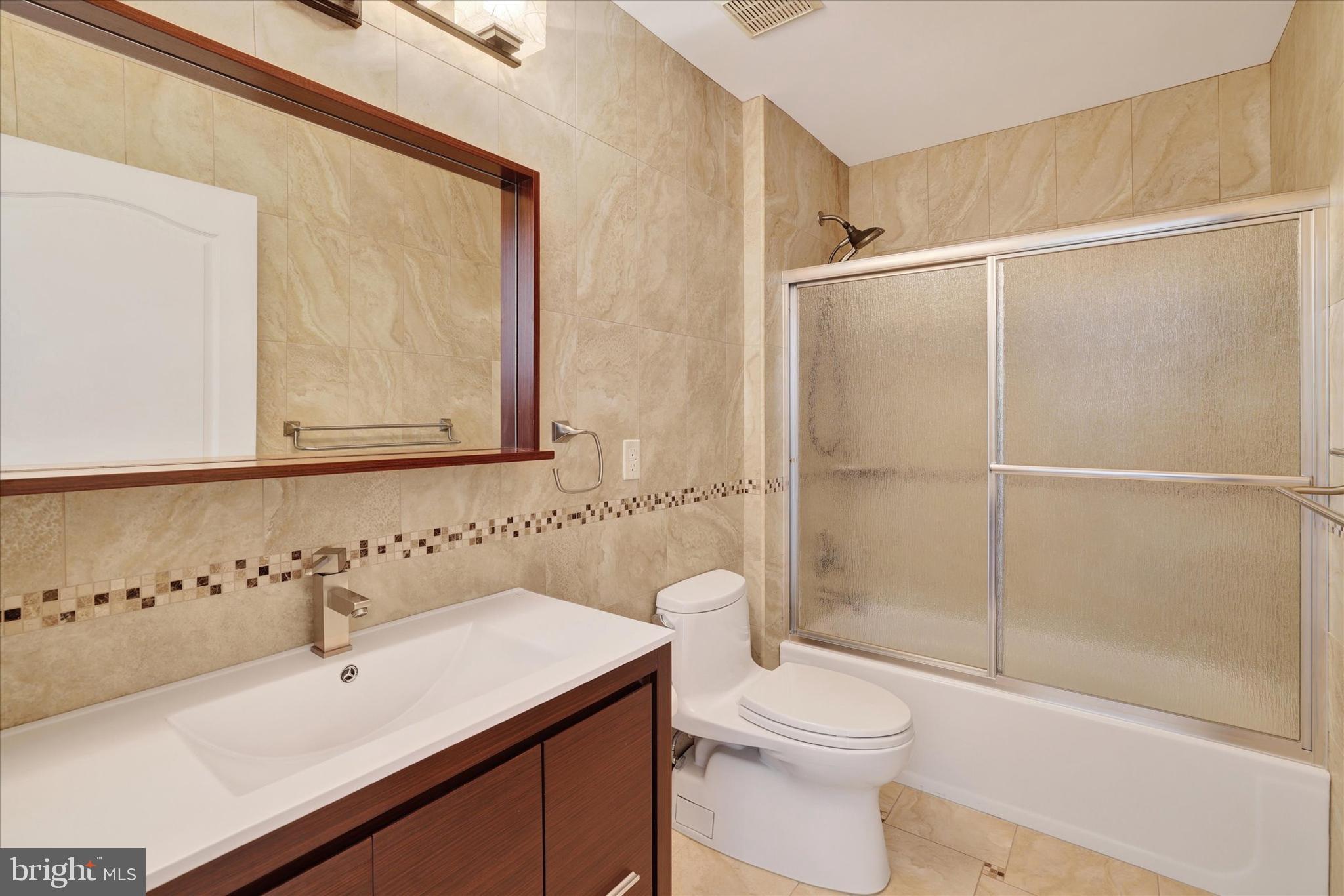 131 Hope Road Holland, PA 18966 - Photo 33 of 55 a bathroom with a sink toilet and shower