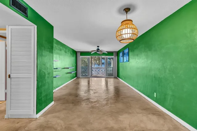 a view of hall with fan