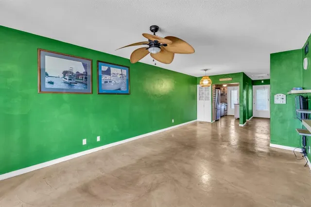 a view of a hallway with a yellow slide