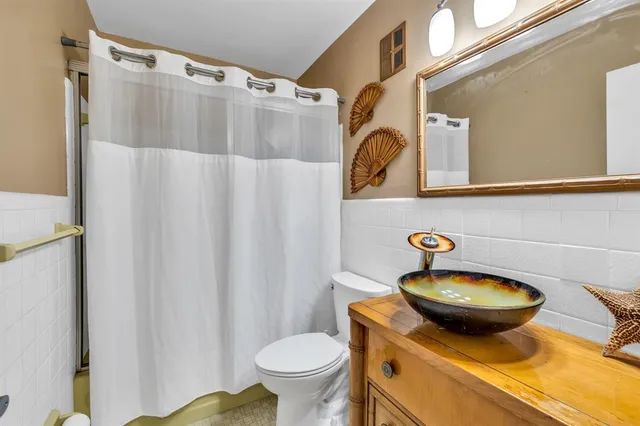 a bathroom with a sink and a toilet