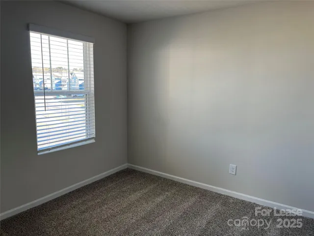 a bathroom with a tub sink and shower