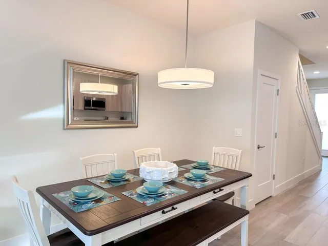 a view of a dining room with furniture