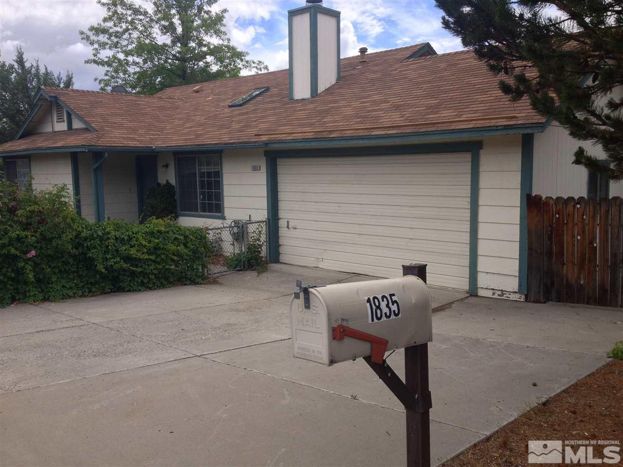 1835 Peavine Road Reno, NV 89503 - Photo 1 of 1 a front view of a house with garden