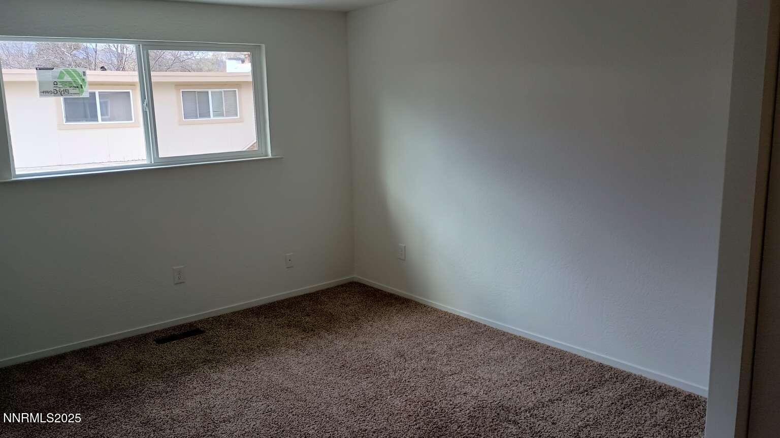 68 Condor Circle Carson City, NV 89701 - Photo 15 of 23 a view of an empty room with a window