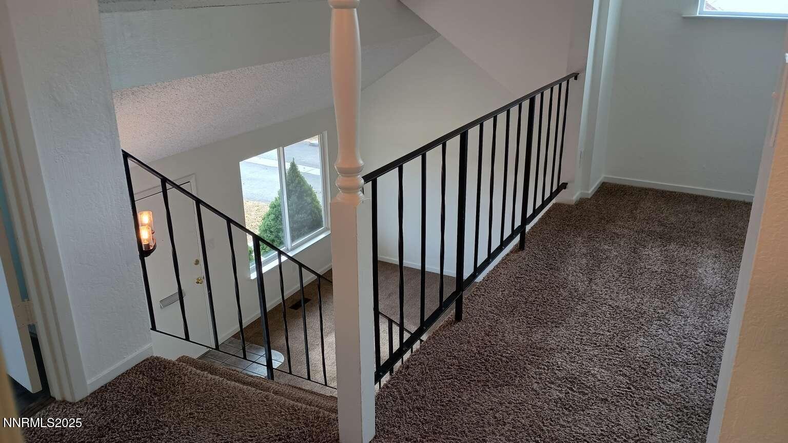 68 Condor Circle Carson City, NV 89701 - Photo 23 of 23 a view of a hallway with stairs