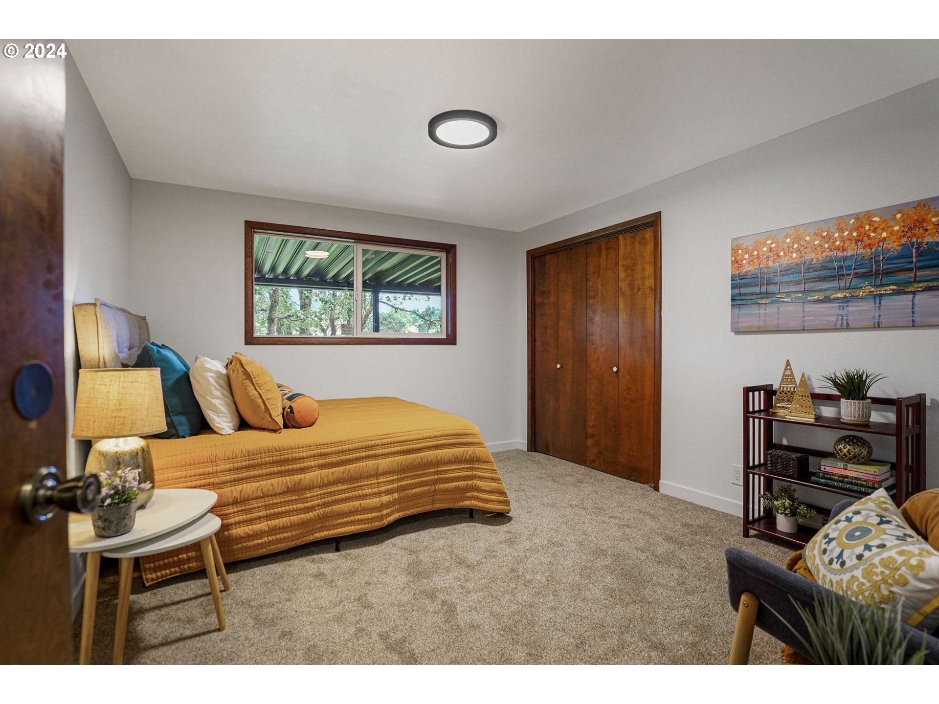 7565 Bates Road South Salem, OR 97306 - Photo 14 of 29 a bedroom with a bed and dresser with chair