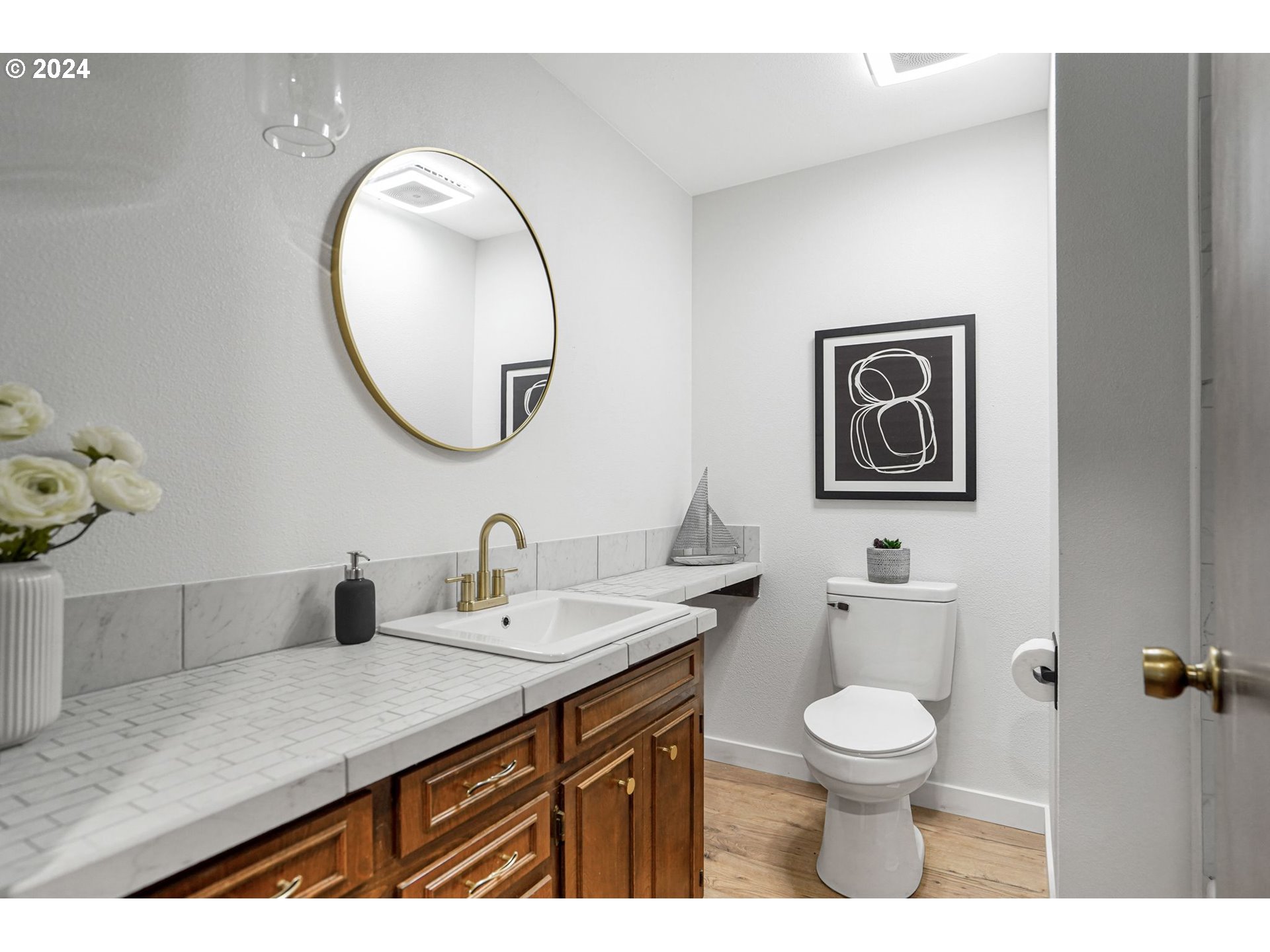7565 Bates Road South Salem, OR 97306 - Photo 15 of 29 a bathroom with a toilet a sink and mirror