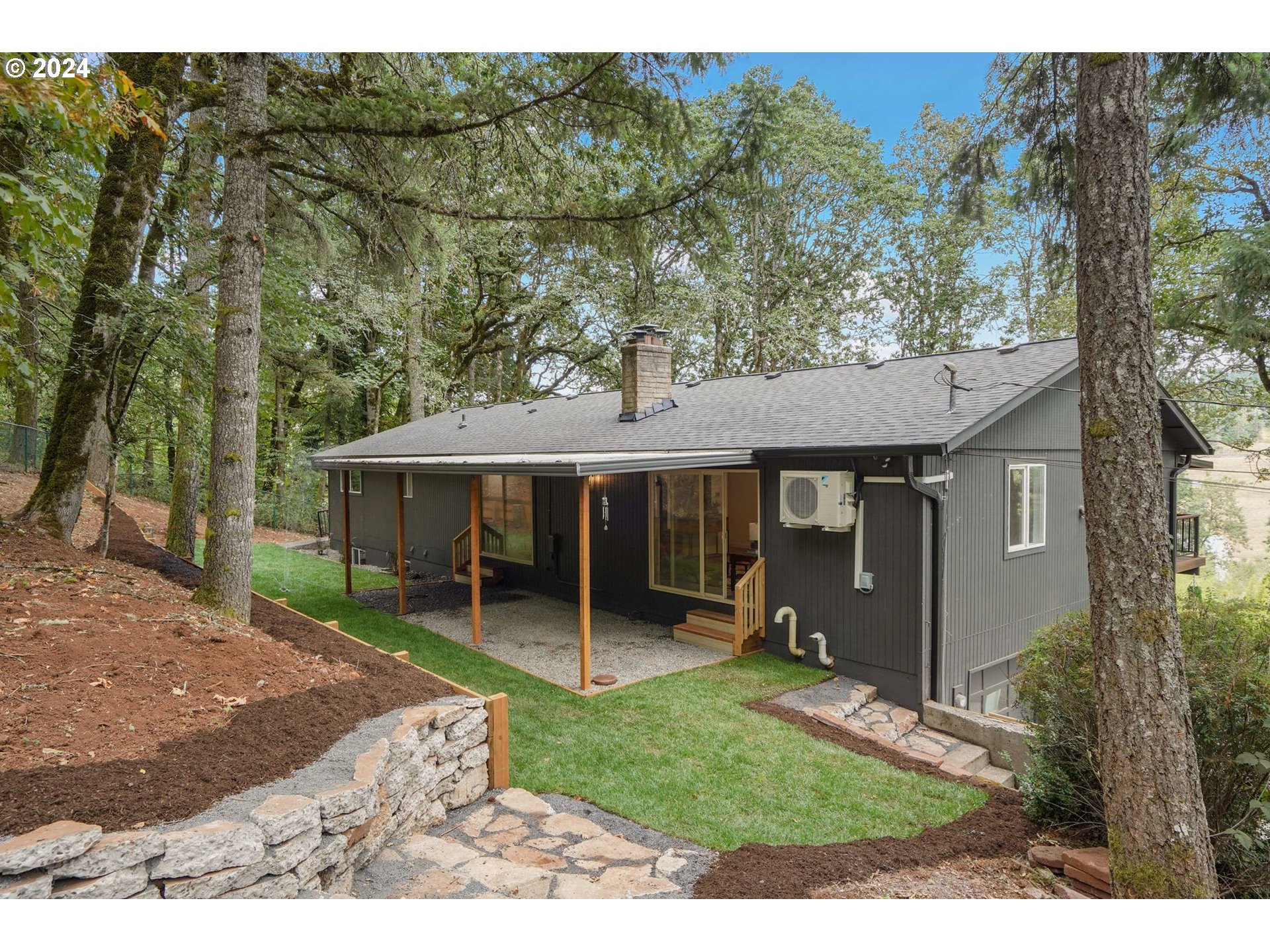 7565 Bates Road South Salem, OR 97306 - Photo 22 of 29 a backyard of a house with table and chairs