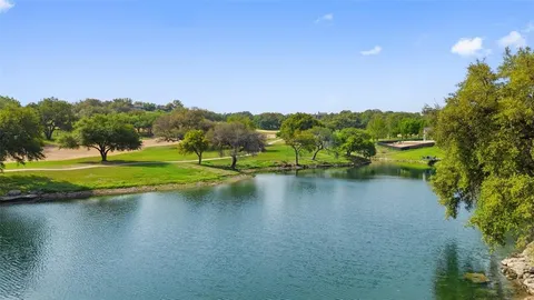 a view of a lake with houses