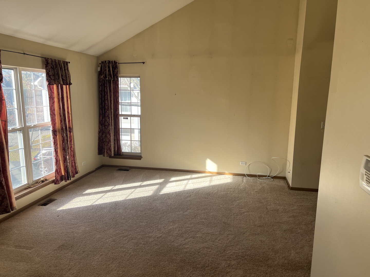 2750 Shelly Lane Aurora, IL 60504 - Photo 3 of 32 an empty room with windows and entrance