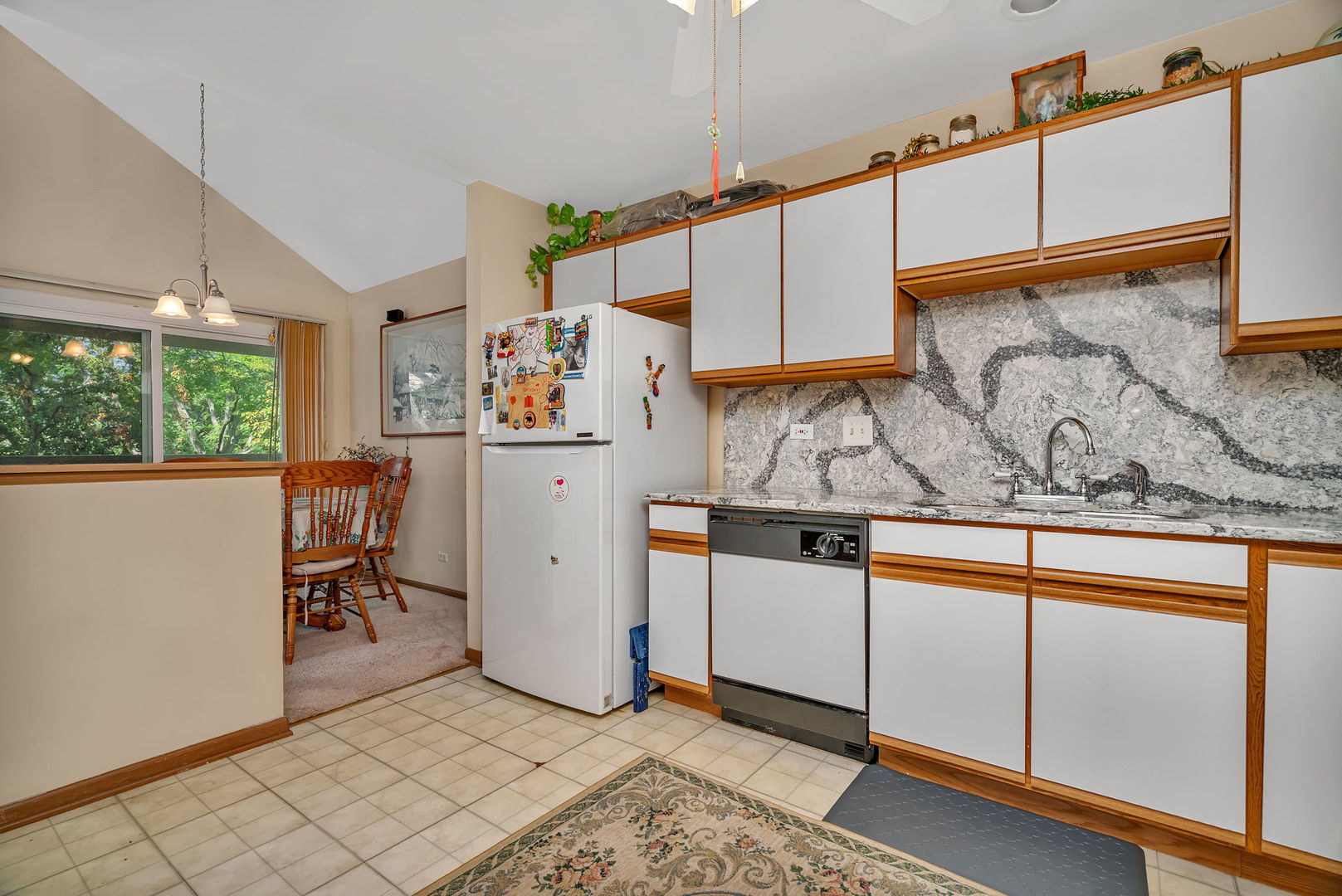 2750 Shelly Lane Aurora, IL 60504 - Photo 8 of 32 a kitchen with stainless steel appliances granite countertop a refrigerator and a stove