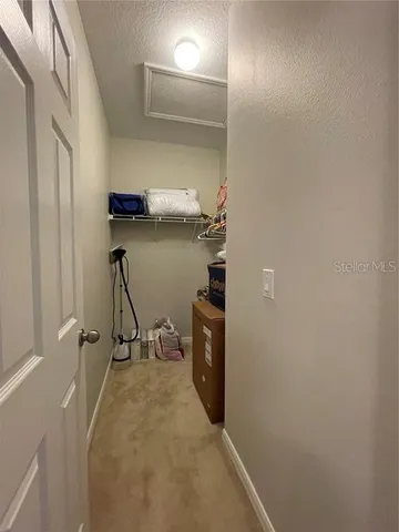 a view of a workspace with furniture