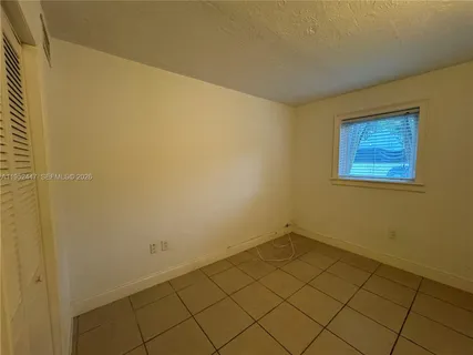 a view of a room with a window