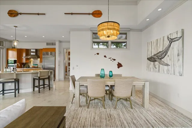a view of dining room and hall with furniture