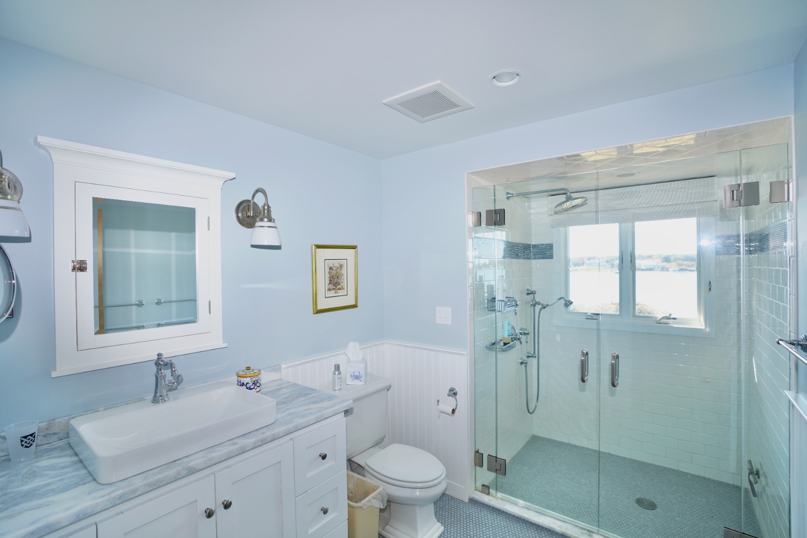 30 Calebs Pond Road Edgartown, MA 02539 - Photo 11 of 35 a bathroom with a sink a toilet and shower