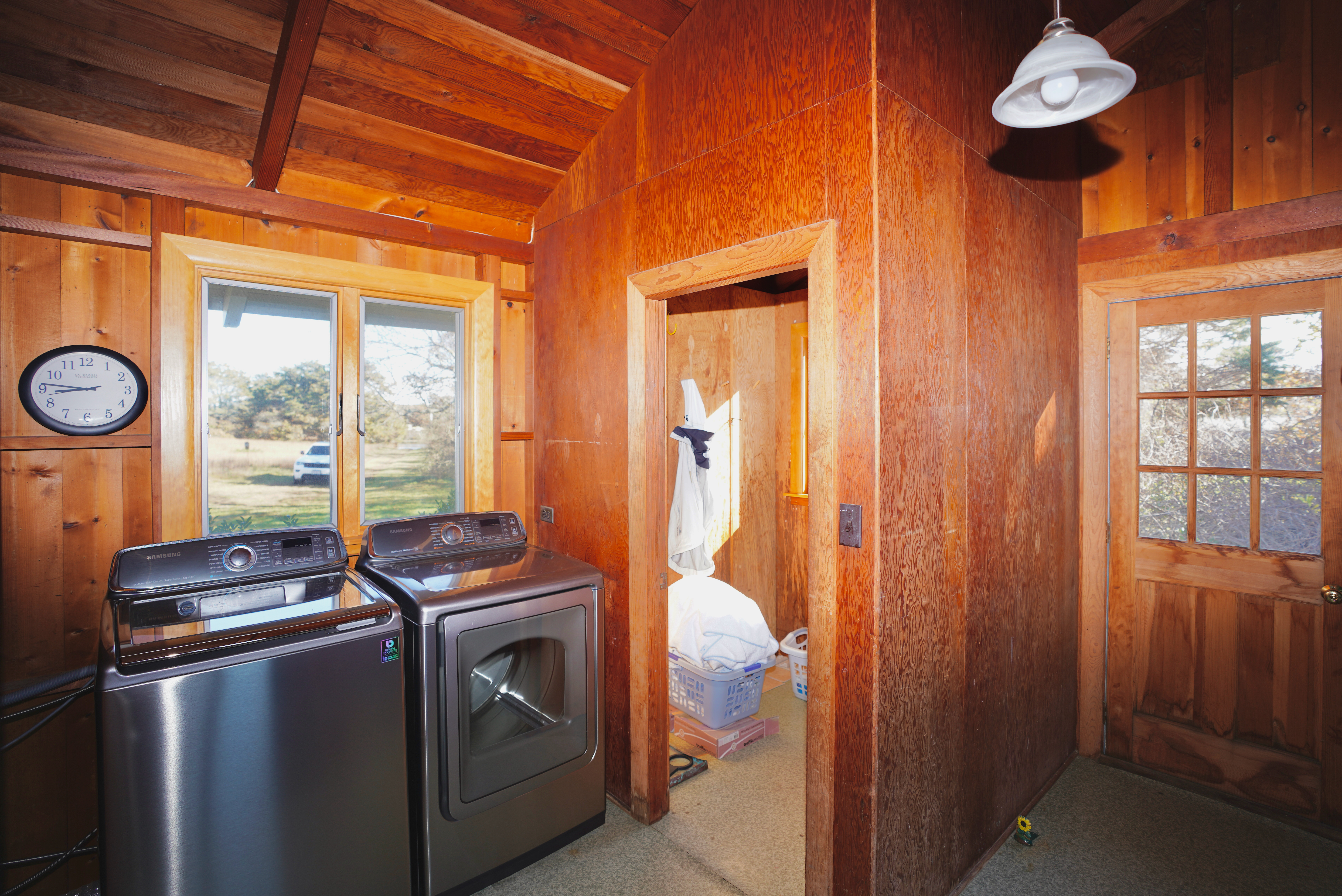 30 Calebs Pond Road Edgartown, MA 02539 - Photo 17 of 35 a utility room with dryer and washer