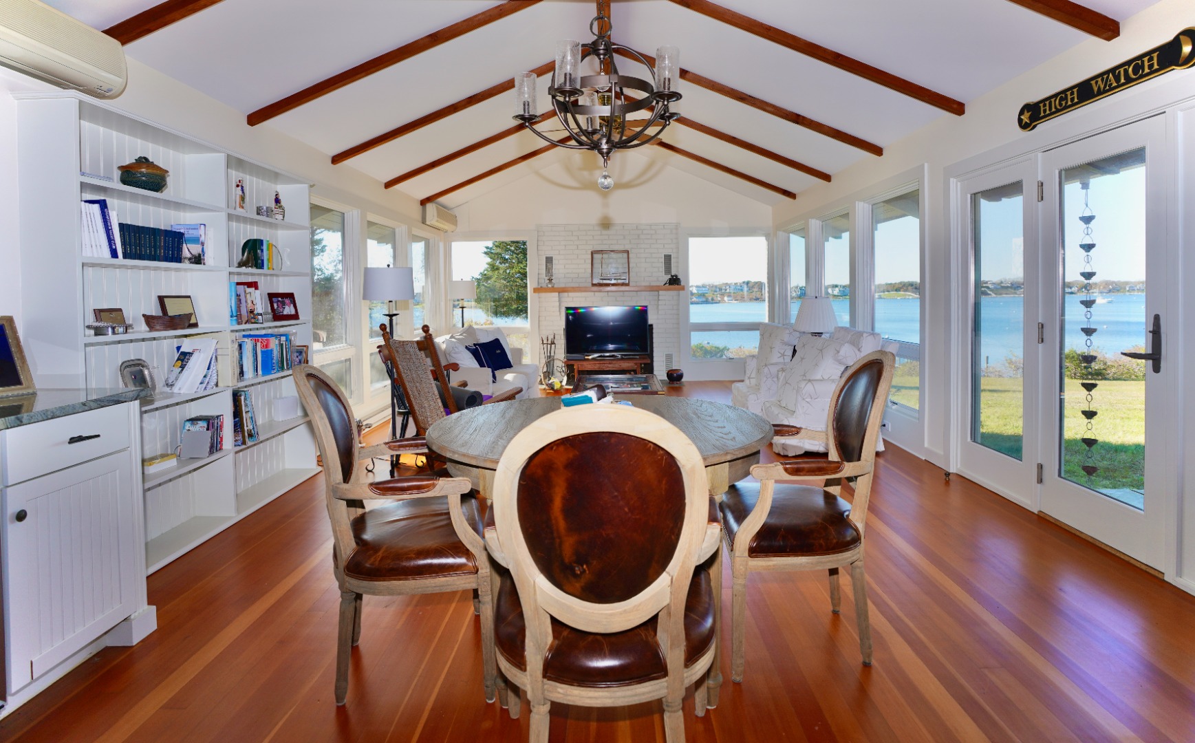 30 Calebs Pond Road Edgartown, MA 02539 - Photo 2 of 35 a view of a dining room with furniture window and wooden floor