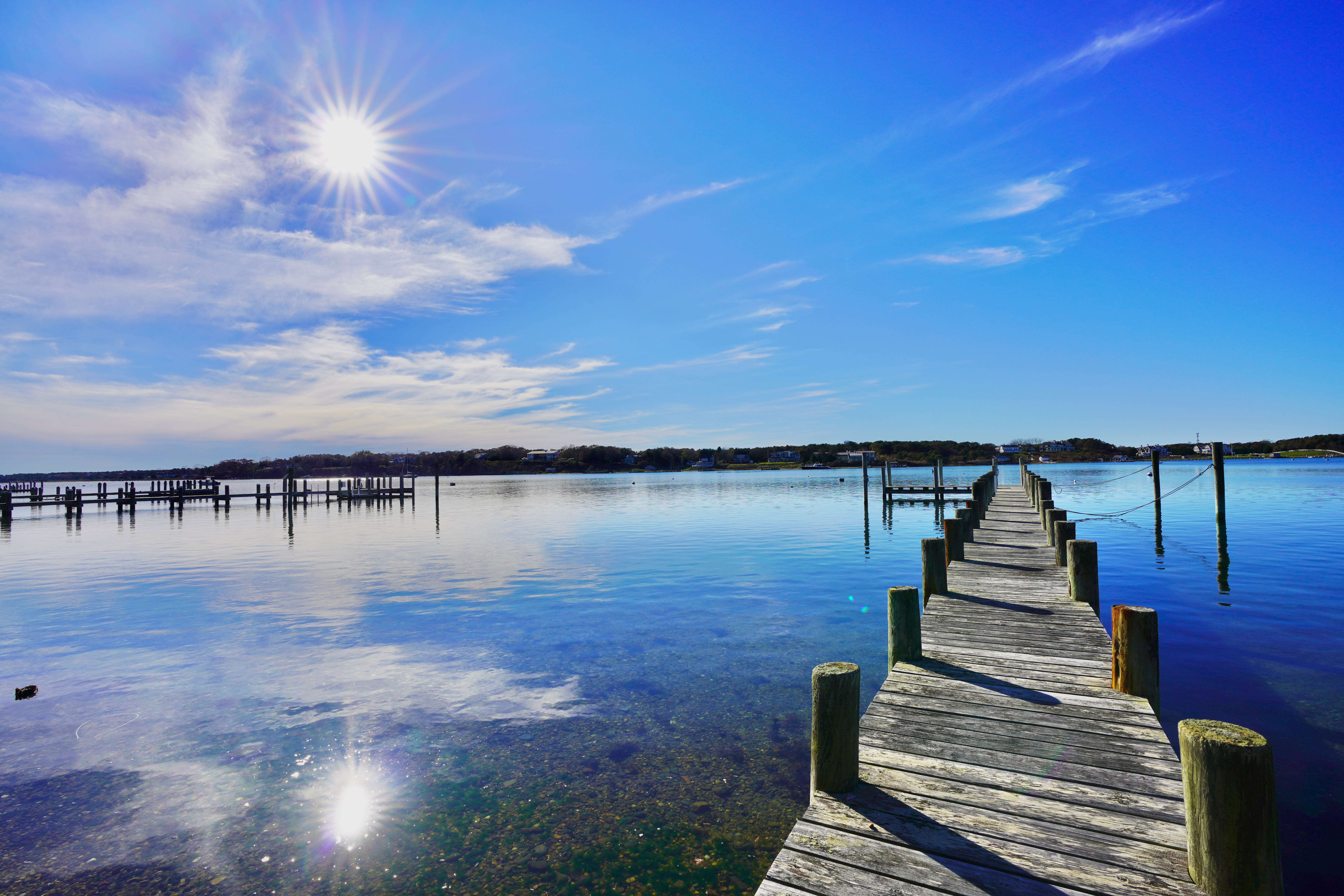 30 Calebs Pond Road Edgartown, MA 02539 - Photo 22 of 35 a view of a lake with sitting space