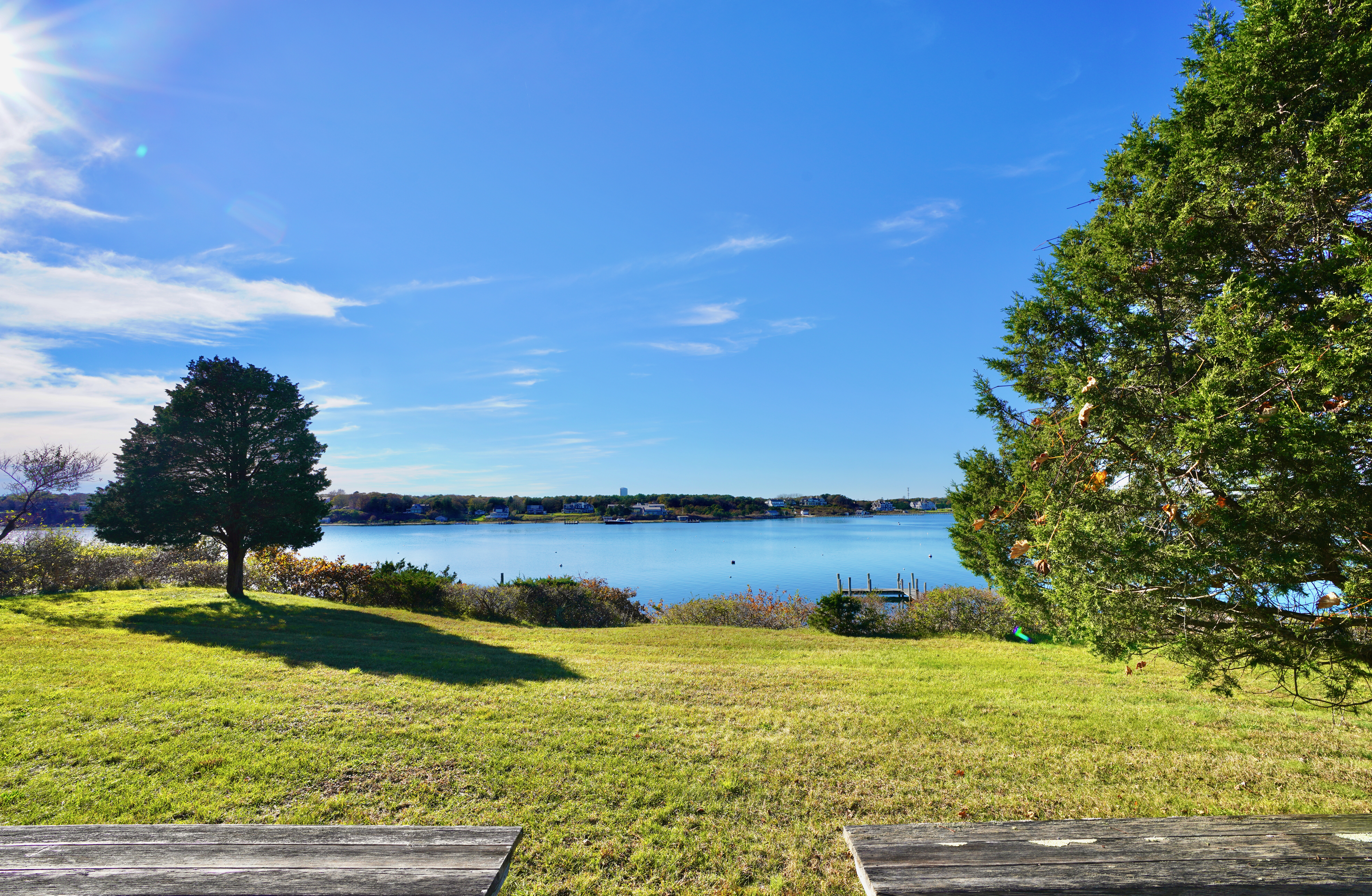 30 Calebs Pond Road Edgartown, MA 02539 - Photo 34 of 35 a view of a lake with a yard