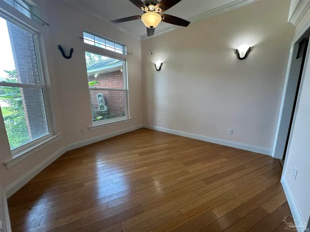 a dining room with furniture and chandelier
