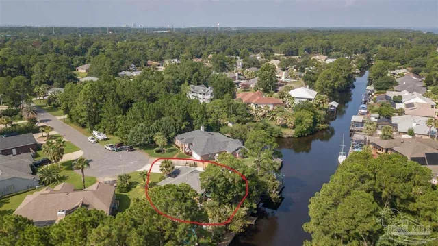 an aerial view of residential house with outdoor space