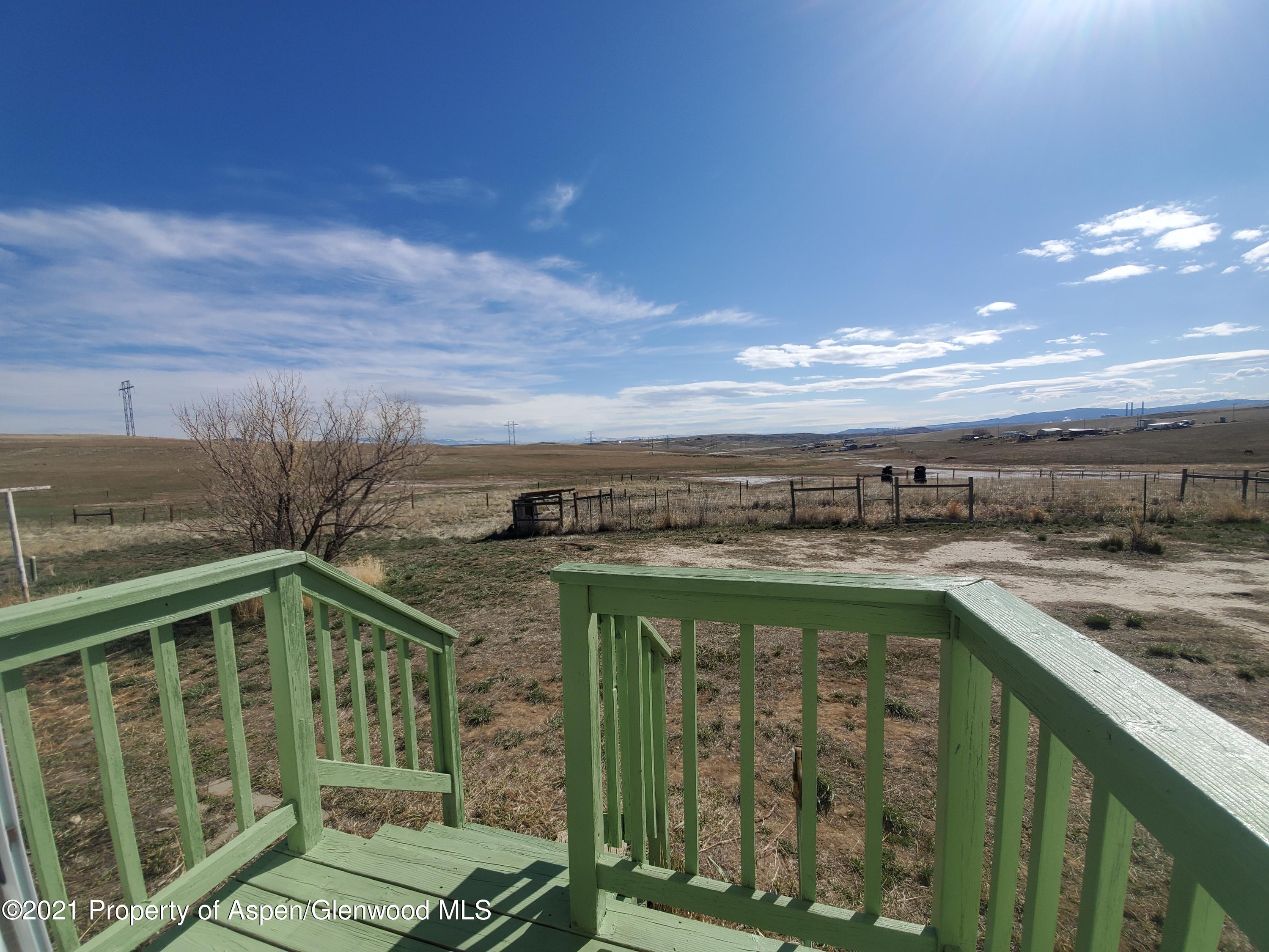 275 Roberts Road Craig, CO 81625 - Photo 3 of 16 a view of a terrace with a yard