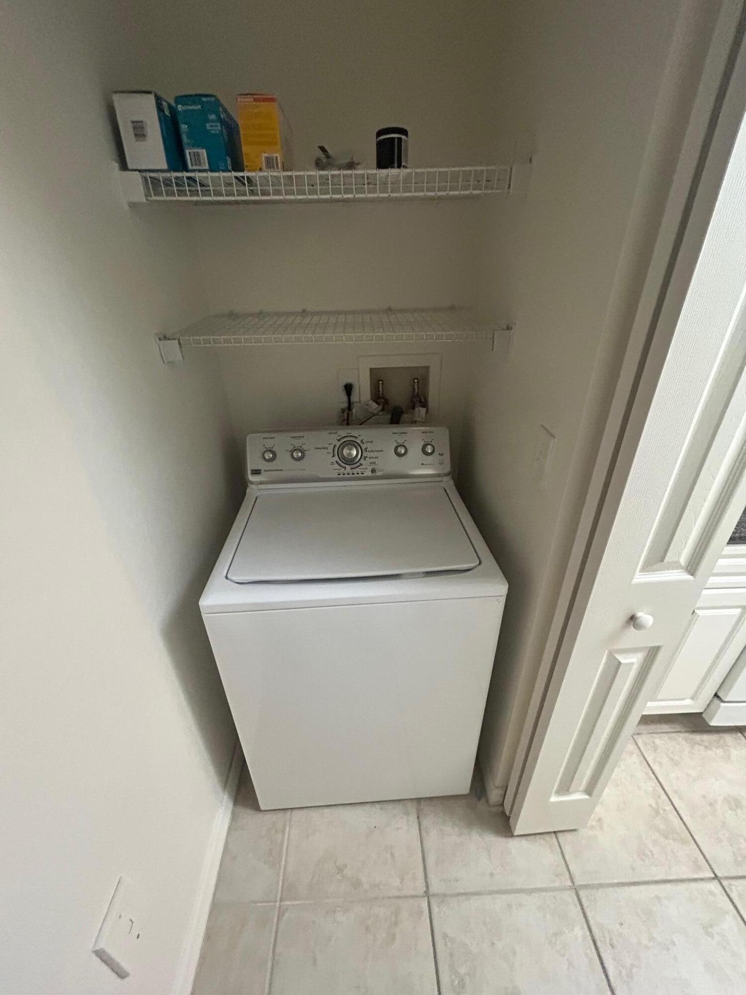 272 Southeast Kitching Circle Stuart, FL 34994 - Photo 19 of 23 a utility room with dryer and washer