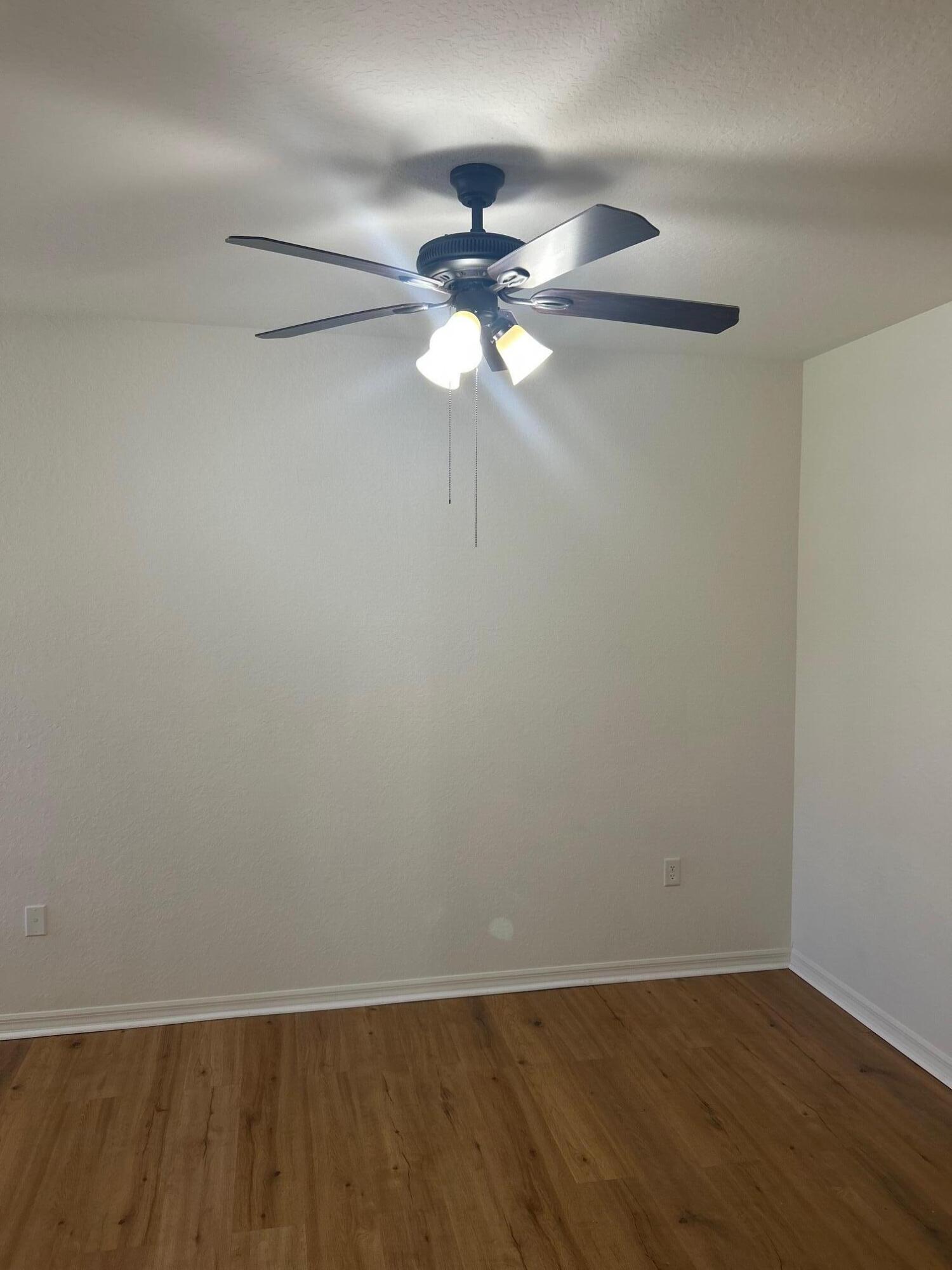 272 Southeast Kitching Circle Stuart, FL 34994 - Photo 4 of 23 a window in an empty room