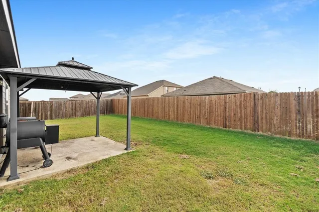 a garden view with a seating space