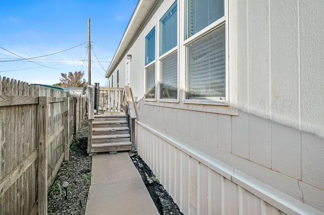 a view of a stairs and an entrance door
