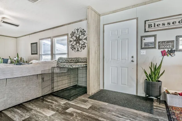 a kitchen with sink and cabinets