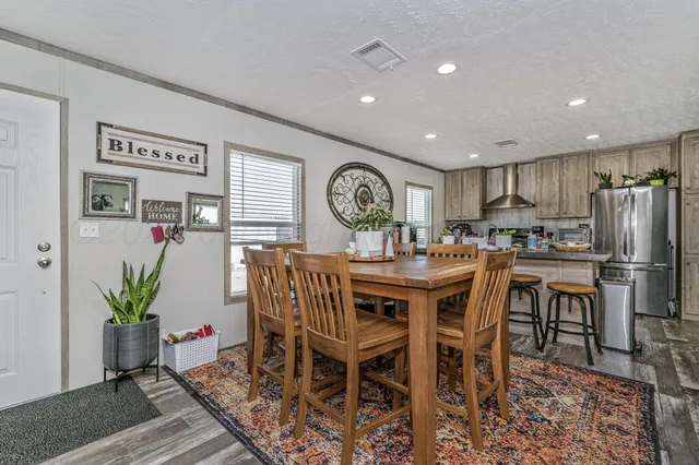 a view of a dining room with furniture