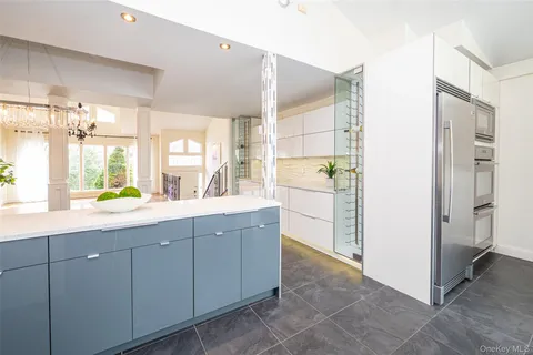 a kitchen with cabinets and a sink