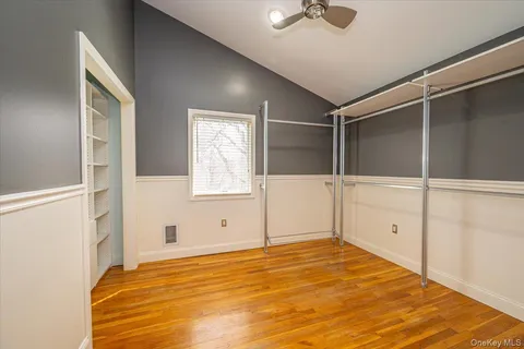 a view of an empty room with a fireplace
