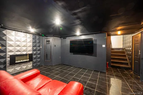 a view of an empty room with a fireplace