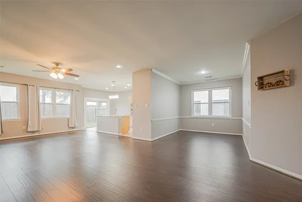 a kitchen with stainless steel appliances granite countertop a sink and a stove