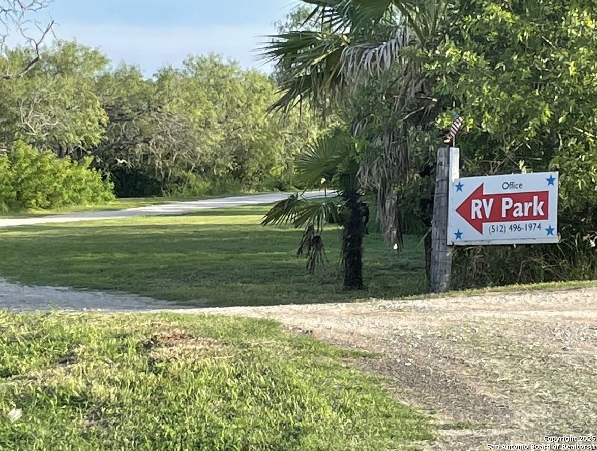 1197 FM 2443 Road Kenedy, TX 78119 - Photo 2 of 18 a view of a park with trees