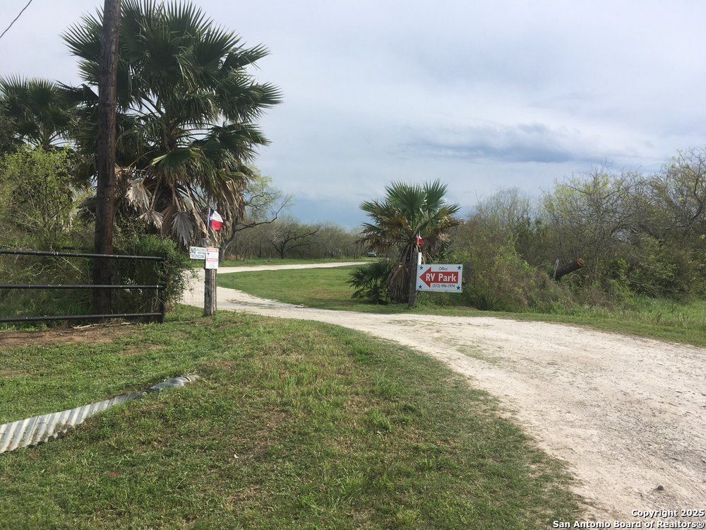 1197 FM 2443 Road Kenedy, TX 78119 - Photo 7 of 18 a view of outdoor space with garden