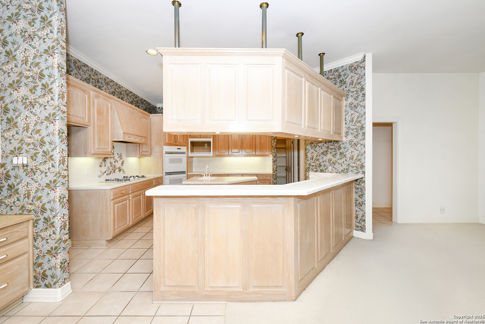 13 Westelm Circle San Antonio, TX 78230 - Photo 17 of 46 a kitchen with stainless steel appliances a sink and cabinets
