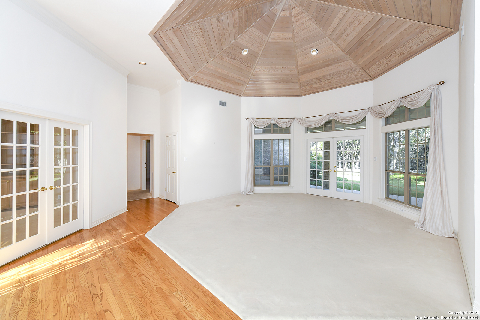 13 Westelm Circle San Antonio, TX 78230 - Photo 5 of 46 a spacious bedroom with a large bed and a large window
