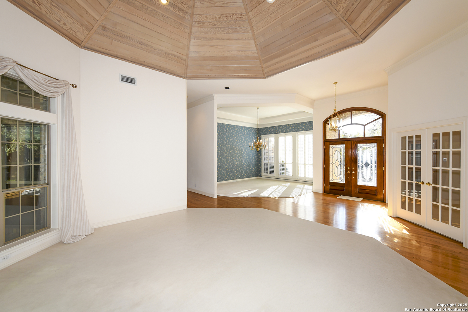 13 Westelm Circle San Antonio, TX 78230 - Photo 7 of 46 a view of an empty room with window and a kitchen view