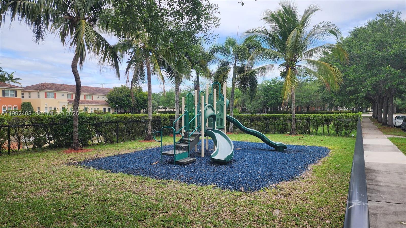 2607 Southwest 99th Way Miramar, FL 33025 - Photo 46 of 50 a view of a park with a slide